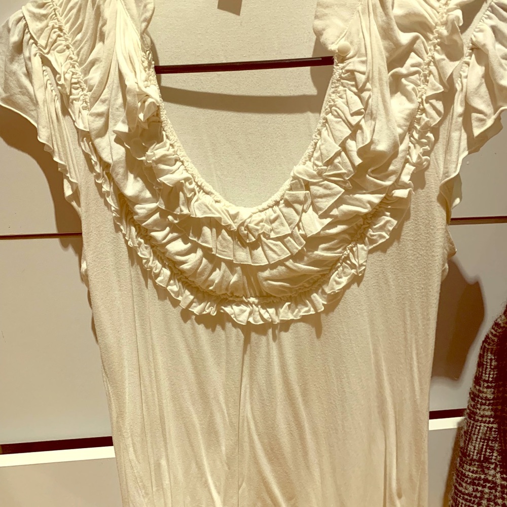 Cream ruffle blouse with button closure option